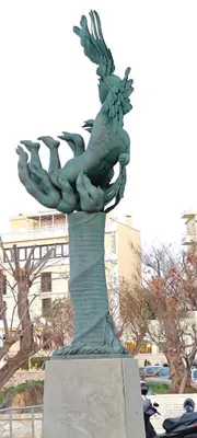 a statue of a person on top of a pedestal at Color Living in Chania Town