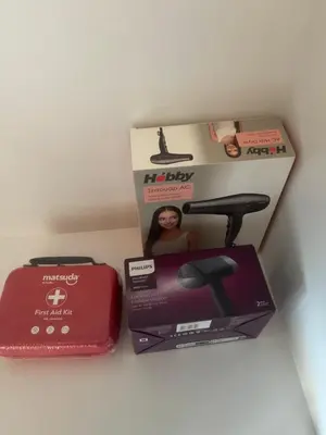 two boxes of a hair dryer and a box of a scale at Michalis-Nina studios in Livanianá