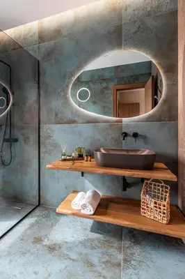 a bathroom with a sink and a mirror at Villa Alargo Heated Pool in Katokhórion