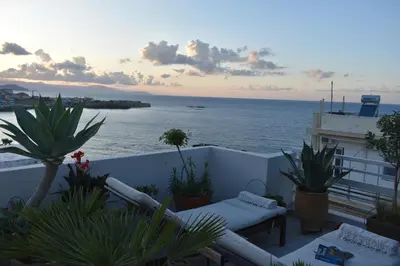 a balcony with a view of the ocean at Diotima - Astonishing seaview apartment in Chania Town