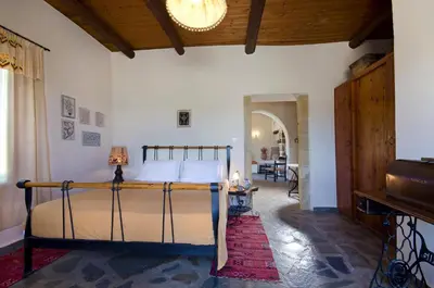 a bedroom with a bed in a room at Kallimento-Dimitra in Kissamos
