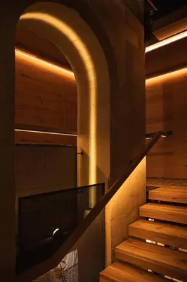 a staircase with an archway in a building at Elysia Boutique Hotel in Chania Town