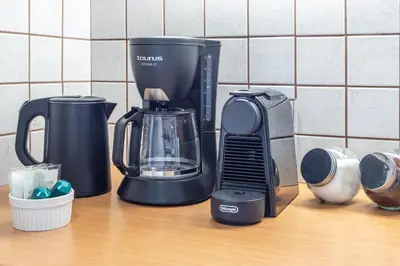 a coffee maker on a counter in a kitchen at Urban Living City Apartment in Chania Town