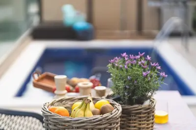 a basket of fruit on a table in a kitchen at Villa Orama - Sea view with private pool in Kalyves