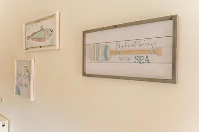 a picture hanging on a wall in a room at Casa Barbara in Stalos