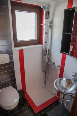 a bathroom with a shower and a sink at Villa Veghera in Kissamos
