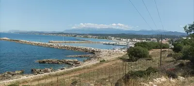 a large body of water with a group of boats at Metoxaki in Dhaskalianá