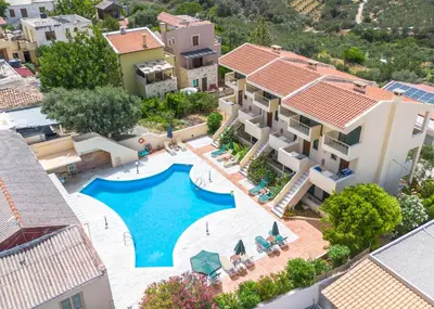 an aerial view of a villa with a swimming pool at The Orestis Old Cottage House in Stalos