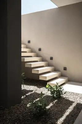 a set of stairs in a room with plants at Memoire Guest House I Private Heated Pool I 200m beach in Chania Town