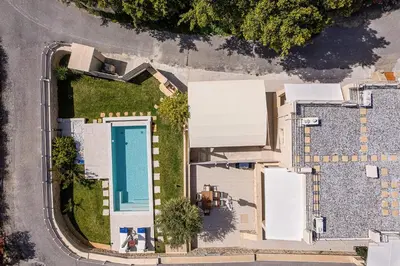 an overhead view of a house with a swimming pool at Villa Crista in Áptera