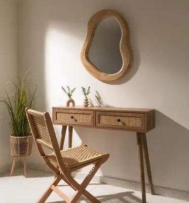 a dressing table with a chair and a mirror at Pithos Apartment in Korakiaí