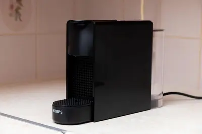 a black speaker sitting on top of a counter at Lyria Hotel Apartments in Stalos