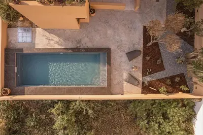 an overhead view of a swimming pool in a yard at Aeri Residence in Chania Town