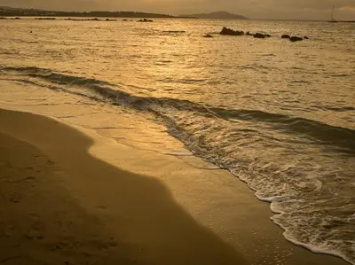 a sandy beach with the ocean in the background at Atria Serenity Stay in Chania Town