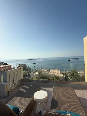 a balcony with a view of the ocean at Eteà Sea Penthouse-In the heart of chania in Chania Town