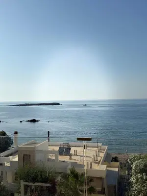 a view of the ocean from a building at Eteà Sea Penthouse-In the heart of chania in Chania Town