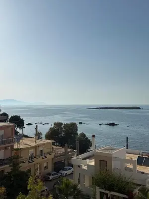 a view of the ocean from a building at Eteà Sea Penthouse-In the heart of chania in Chania Town