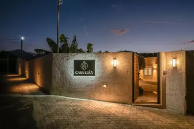 a sign on the side of a building at night at Casa Elea in Kissamos