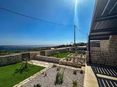 a house with a view of the ocean at Gialos Villas Paleochora in Palaiochóra