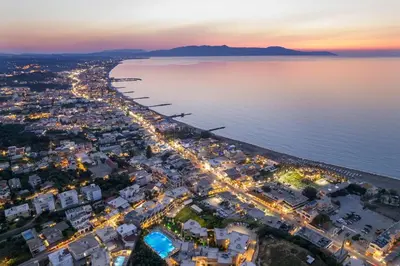 an aerial view of a city at night at NEA Dreamy Houses in Agia Marina Nea Kydonias