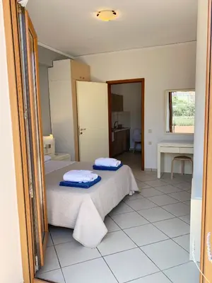 a bedroom with two beds in a room at Platanias Memories Studio 3 in Plataniás