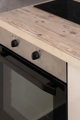 a wooden counter top on top of a stove at andys house in Chania