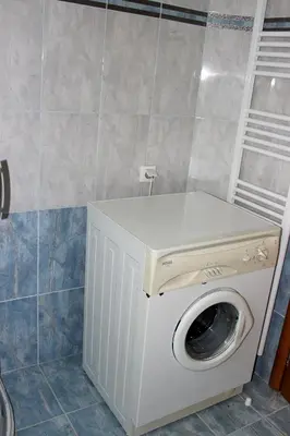 a washer and dryer in a bathroom at Villa Sofia Filoxenia in Kalyves