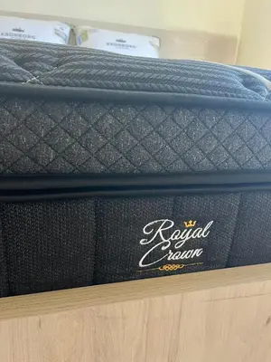 a mattress on a shelf with a royal mum sign on it at Two little olives Studio apartment in Kissamos