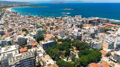 an aerial view of a city and the ocean at Jimmis Apartment in Chania Town