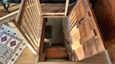an overhead view of a wooden door and stairs at The Root House - Crete Stay in Vafés