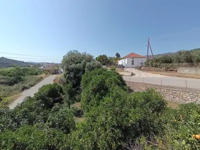 a view of a road with trees and a street at Veranda with endless view in Fournés