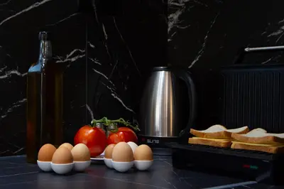 a counter with eggs and bread and a bottle of wine at ''Filoxenia'' of the 11 Brothers in Kissamos