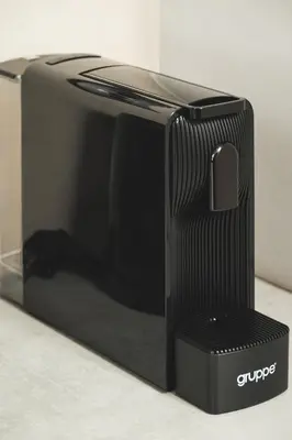 a black microwave oven sitting on top of a counter at ES Apartments ARION in Chania Town
