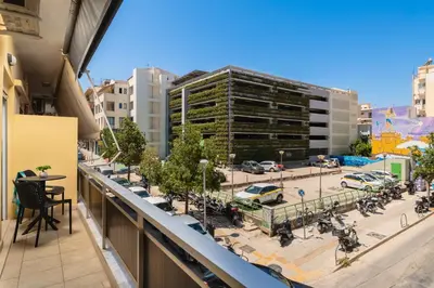 an apartment balcony with a view of a parking lot at ES Apartments ARION in Chania Town