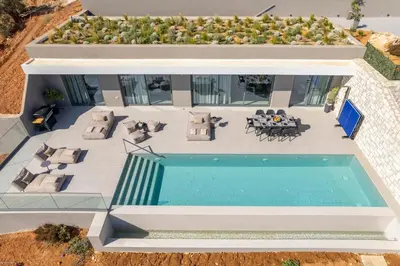 an aerial view of a house with a swimming pool at Sky Sea View Villas in Chania Town
