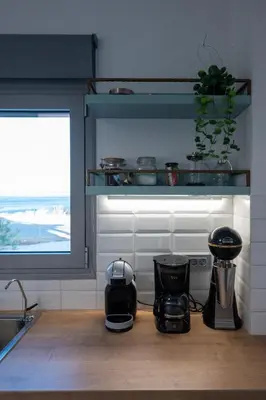 a kitchen with appliances on a wooden counter top at Villa Akalli in Frangokastello