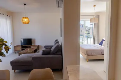 a living room with a couch and a bed at Phaedrus Living Seaside Thalassa Cretan 101 in Módhion