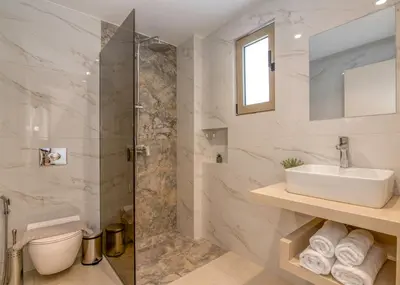 a bathroom with a sink and a shower at Elafonisi Pearl in Elafonisi