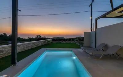 a swimming pool in the backyard of a house at Elafonisi Pearl in Elafonisi