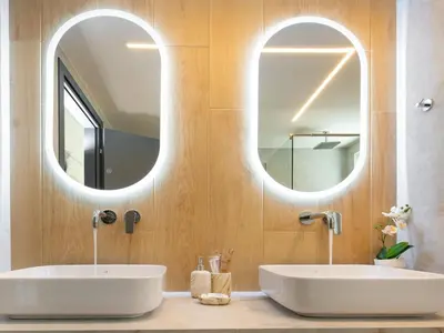 two sinks in a bathroom with two mirrors at PanStel - Villa Solene with private pool in Ayiá