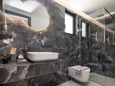 a bathroom with a sink and a mirror at PanStel - Villa Solene with private pool in Ayiá