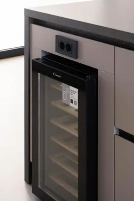 a refrigerator with a glass door in a kitchen at Gemini Villas Chania - Calma & Siesta in Maleme