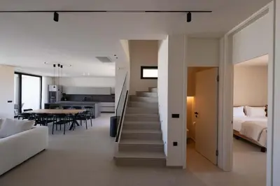 a staircase leading to the bedroom in a house at Gemini Villas Chania - Calma & Siesta in Maleme