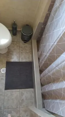 a bathroom with a sink and a toilet in a room at Chania ELIA apARTment Chalepa in Chania Town
