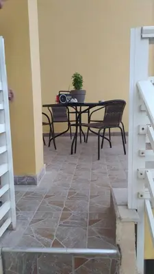 a dining room with a table and chairs at Chania ELIA apARTment Chalepa in Chania Town