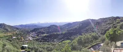 a view of a mountain valley with a bridge at Villa Orgoni in Plataniás