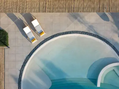an overhead view of a swimming pool in a building at Salisol Villa - Green Oasis in Chania Town