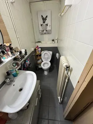 a bathroom with a sink and a toilet at Chania City Center Apartment with Balcony Central Aircon in Chania Town