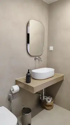 a bathroom with a sink and a mirror at Dimora Cozy Retreat in Chania Old Town in Chania Town