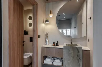 a bathroom with a sink and a mirror at Amara Luxury Suites With Private Hot Tub in Chania Town